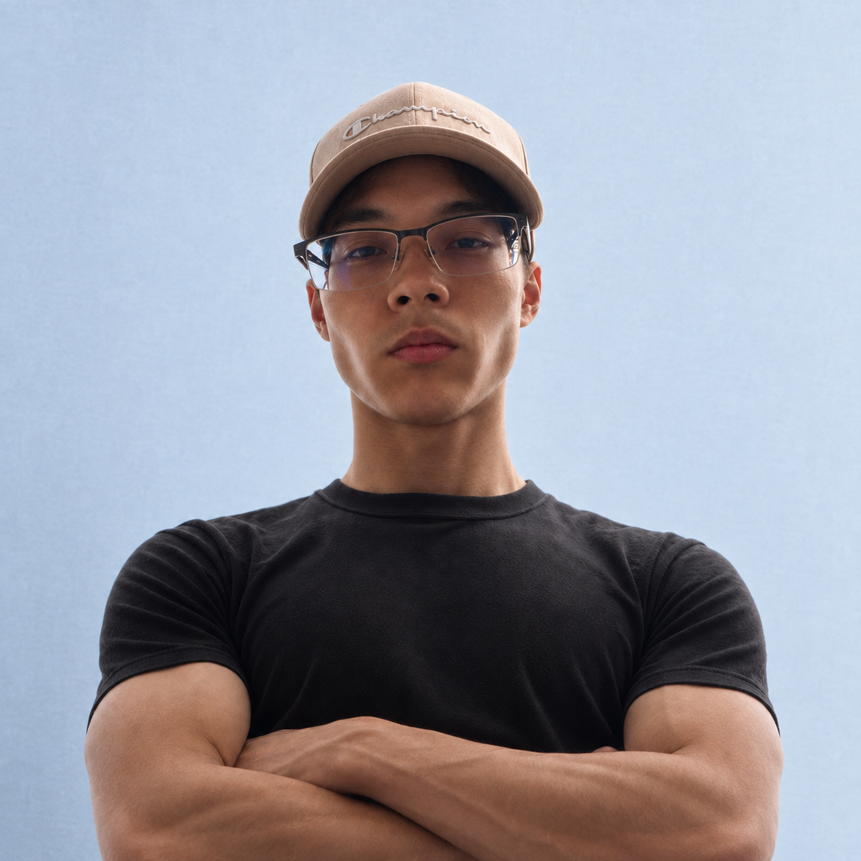 Filip, also known as NightFlare, wearing a beige cap and glasses.